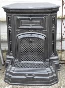 A cast iron fireplace and stove,