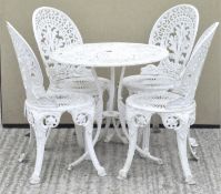 A set of four aluminium garden chairs and a circular table,