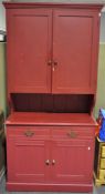A late 19th century red painted pine dresser,