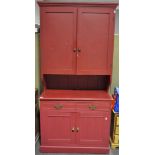 A late 19th century red painted pine dresser,