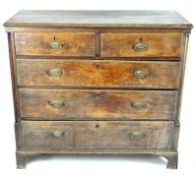 A 19th century oak chest of drawers, two small drawers above three longer ones, brass handles,