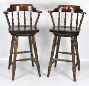 A pair of 20th century bar or kitchen swivel stools,