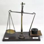 A set of late Victorian/Edwardian balance scales, with brass fittings and weights