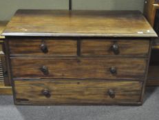 A Victorian mahogany chest of drawers, comprising two short over two long drawers,