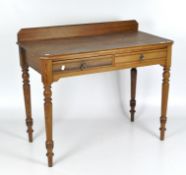 A pine hallway table, early 20th century, with two frieze drawers, on turned baluster legs,