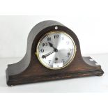 An early 20th century oak cased 1930's mantle clock, marked to movement Fontenoy Made in France,