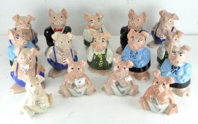 A selection of sixteen Wade ceramic Natwest Pig money banks