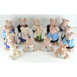A selection of sixteen Wade ceramic Natwest Pig money banks