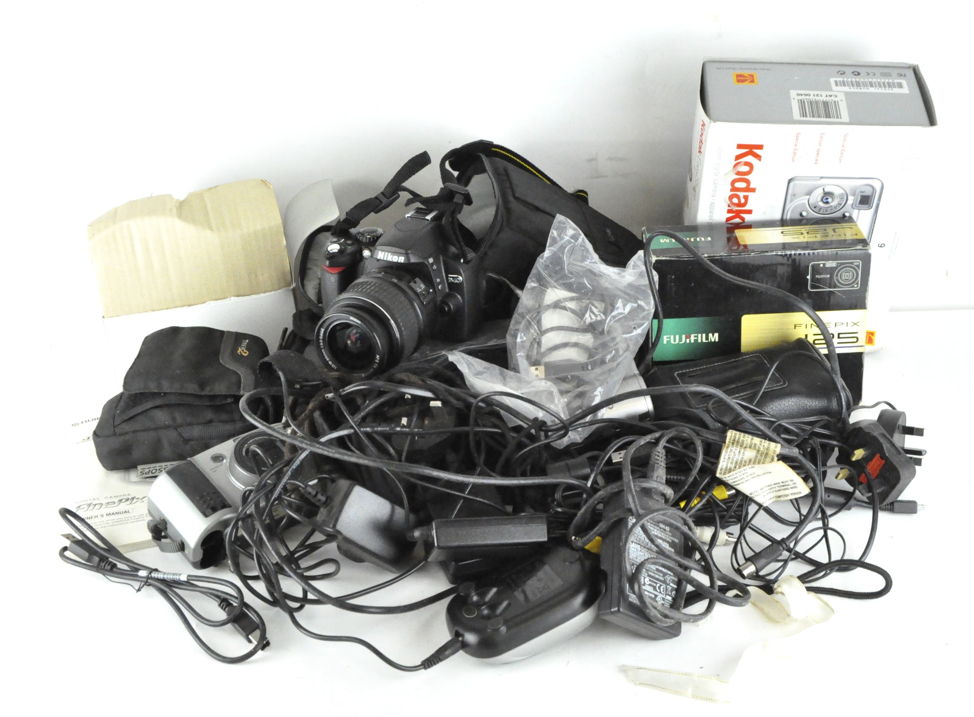 A Nikon D40 digital SLR camera together with various other cameras and related equipment