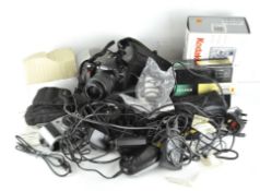 A Nikon D40 digital SLR camera together with various other cameras and related equipment