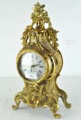 A reproduction 19th century style mantel clock by Robert Grant of London,