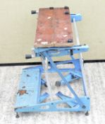 A Black and Decker adjustable Workmate,