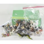 A collection of assorted vintage toys, most being plastic, including various tropical animals,