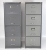 Two vintage filing cabinets, each with four sliding drawers, one with key,