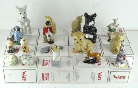 A collection of nineteen Wade ceramic figures, various designs and models,