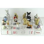 A collection of nineteen Wade ceramic figures, various designs and models,