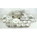 An extensive Royal Doulton 'Larchmont' pattern tea and dinner service, to include tureens, ramekins,