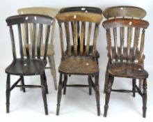 Six vintage kitchen chairs, assorted woods, all with spindle backs,