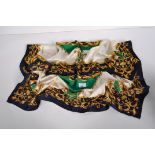 A Viyella silk scarf with blue border and a central green cartouche,