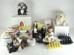 A collection of assorted Wade ceramic figures and wares, various designs and models,