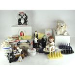 A collection of assorted Wade ceramic figures and wares, various designs and models,
