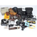 A large quantity of cameras, related accessories parts and more, including a Praktina FX,