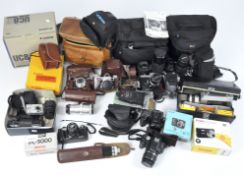 A large quantity of cameras, related accessories parts and more, including a Praktina FX,