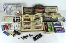 An assortment of die cast model vehicles, including Corgi James Bond 007,