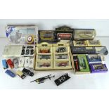 An assortment of die cast model vehicles, including Corgi James Bond 007,