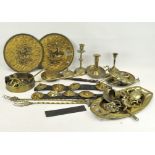 A large selection of assorted brassware and other metalware, to include a chamber stick,