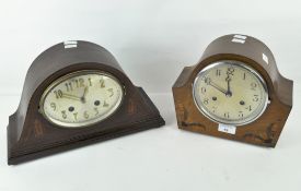 Two early/mid-20th century mahogany mantel clocks, both with inlaid decoration to the front,