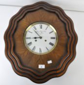 A 20th Century boudoir wall clock, the cream enamel dial with Roman numerals,