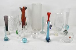 A large quantity of contemporary glass vases, including a number of single stem vases,