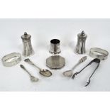 A group of silver and silver plate, including two engine turned silver napkin rings and more