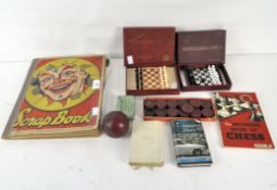 Assorted collectables, to include a bakelite set of draughts, K&C Ltd travelling chess set,