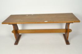 A mid-century oak hall bench, with carved base,
