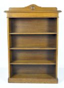 A galleried bookshelf unit with three shelves,