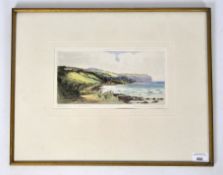 A gilt framed coloured etching depicting a coastal landscape,