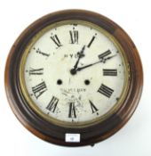 A Hyde Salisbury wall clock with Roman numerals on cream enamel face,