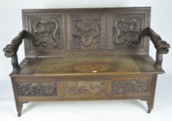 A late 19th/early 20th century Chinese style mahogany monks bench,