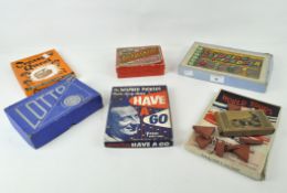 A selection of vintage board games, including 'Treasure Quest', 'British Empire',