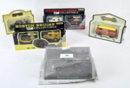 A collection of die-cast vehicles including two Matchbox NHL 75th Anniversary Edition sets,