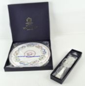 A Royal Worcester cake plate 'Cup of Cups', diamater 28cm, together with a cake knife,