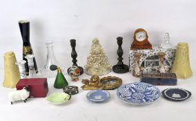 A selection of assorted wares, including a glass decanter and a pair of turned wooden candlesticks,