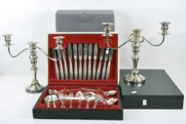 Two silver plated boxed cutlery sets including one vintage example by Community,