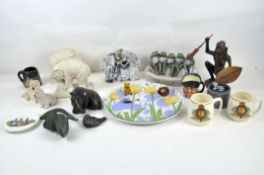 Assorted collectables including a frog dish, a Welsh souvenir dish, various animals,