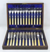 A vintage twelve piece silver plated fish knife and fork set, cased