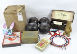 A collection of vintage magic tricks, a set of Banda carpet bowls and other childrens games and toys