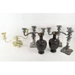 A five sconce silver plated candelabra, 26cm high, together with three smaller examples,