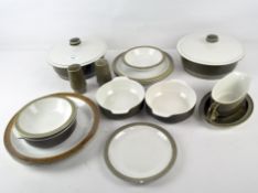 A Poole pottery part dinner set, most being green and white in colour, including dinner plates,